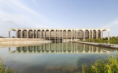 Palazzo Mondadori, modernist space originally designed by Oscar Niemeyer and seen here is the interior renovation by Carlo Ratti using recycled usm shelving