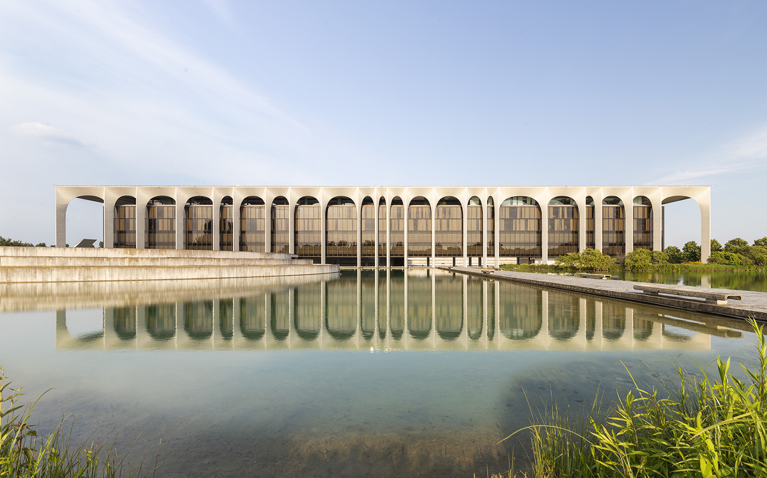 Palazzo Mondadori, modernist space originally designed by Oscar Niemeyer and seen here is the interior renovation by Carlo Ratti using recycled usm shelving