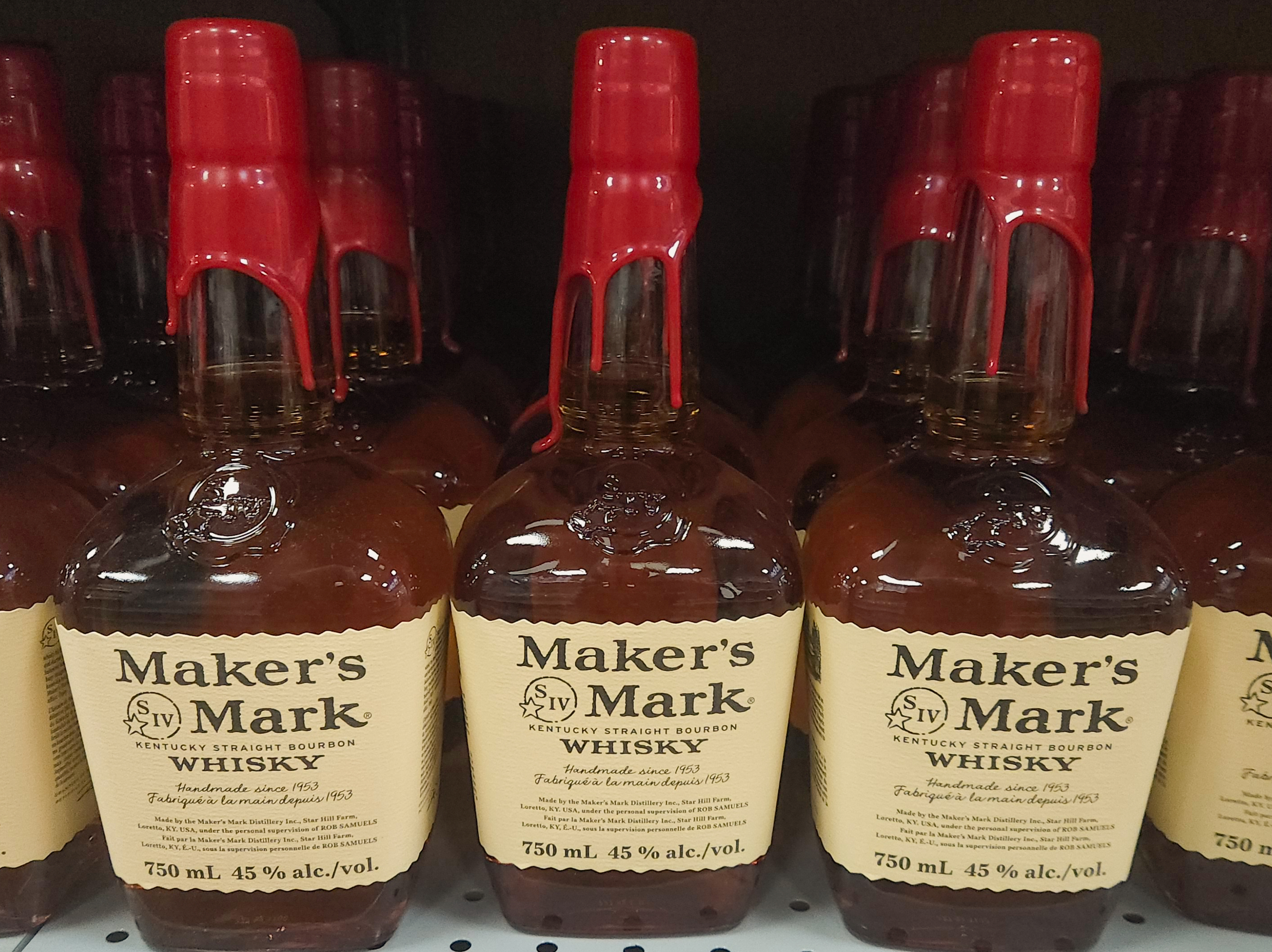 Bottles of Maker's Mark whisky on a shelf