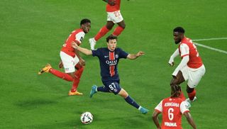 Joao Neves of Paris Saint-Germain in action during the Ligue 1 match between Stade de Reims and Paris Saint-Germain FC at Stade Auguste-Delaune on September 21, 2024 in Reims, France.