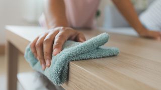 Polishing wood with a cloth