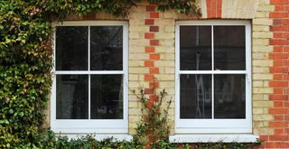timber sash windows in a brick home