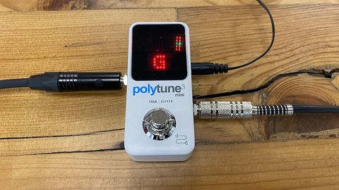 TC Electronic PolyTune 3 Mini tuner on a wooden surface