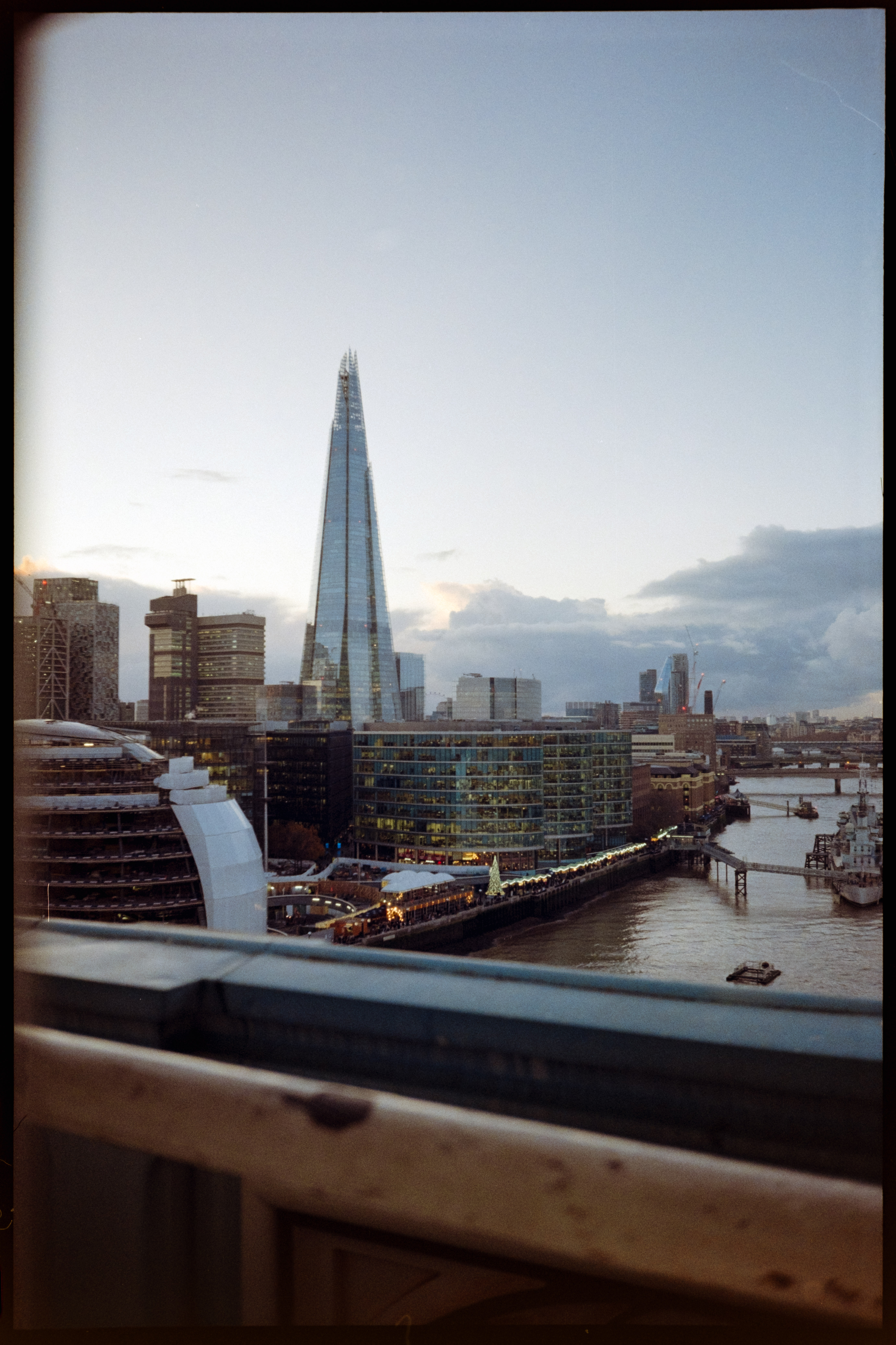 View of the shard in London and the river Thames from Tower Bridge