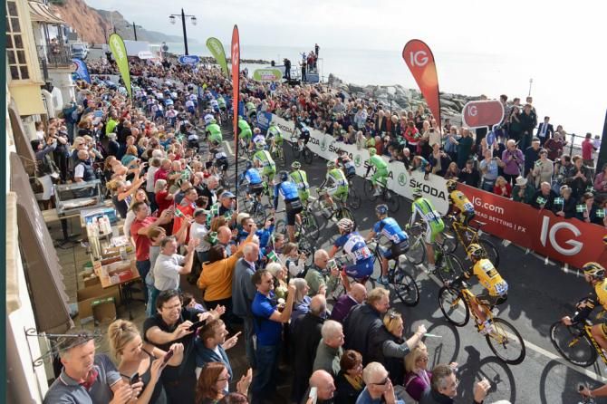Tour of Britain peloton heading out for the start of stage 6 from Sidmouth