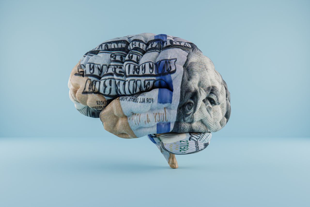 Dollar print on a brain - mental health and money concept