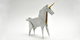 An origami unicorn made of New York Times articles, referencing Blade Runner