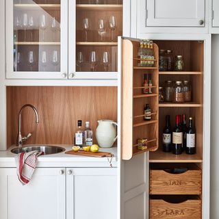 mini bar with drinks and wooden shelves