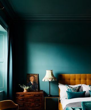 jade green colour drenched bedroom