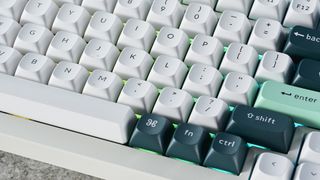 The Keychron Q1 HE magnetic keyboard in white and green