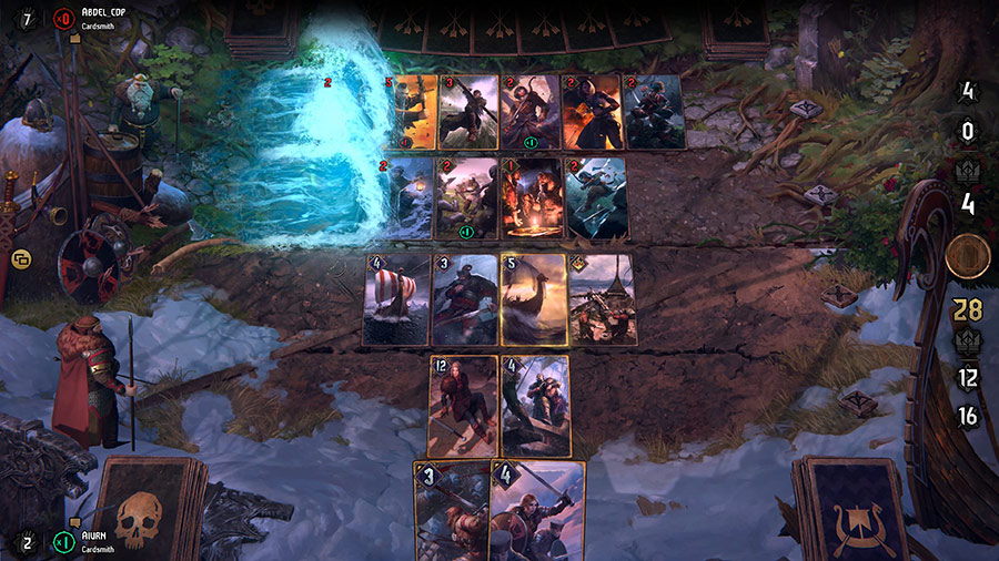 Several Gwent cards arranged on a board that looks like a snowy forest