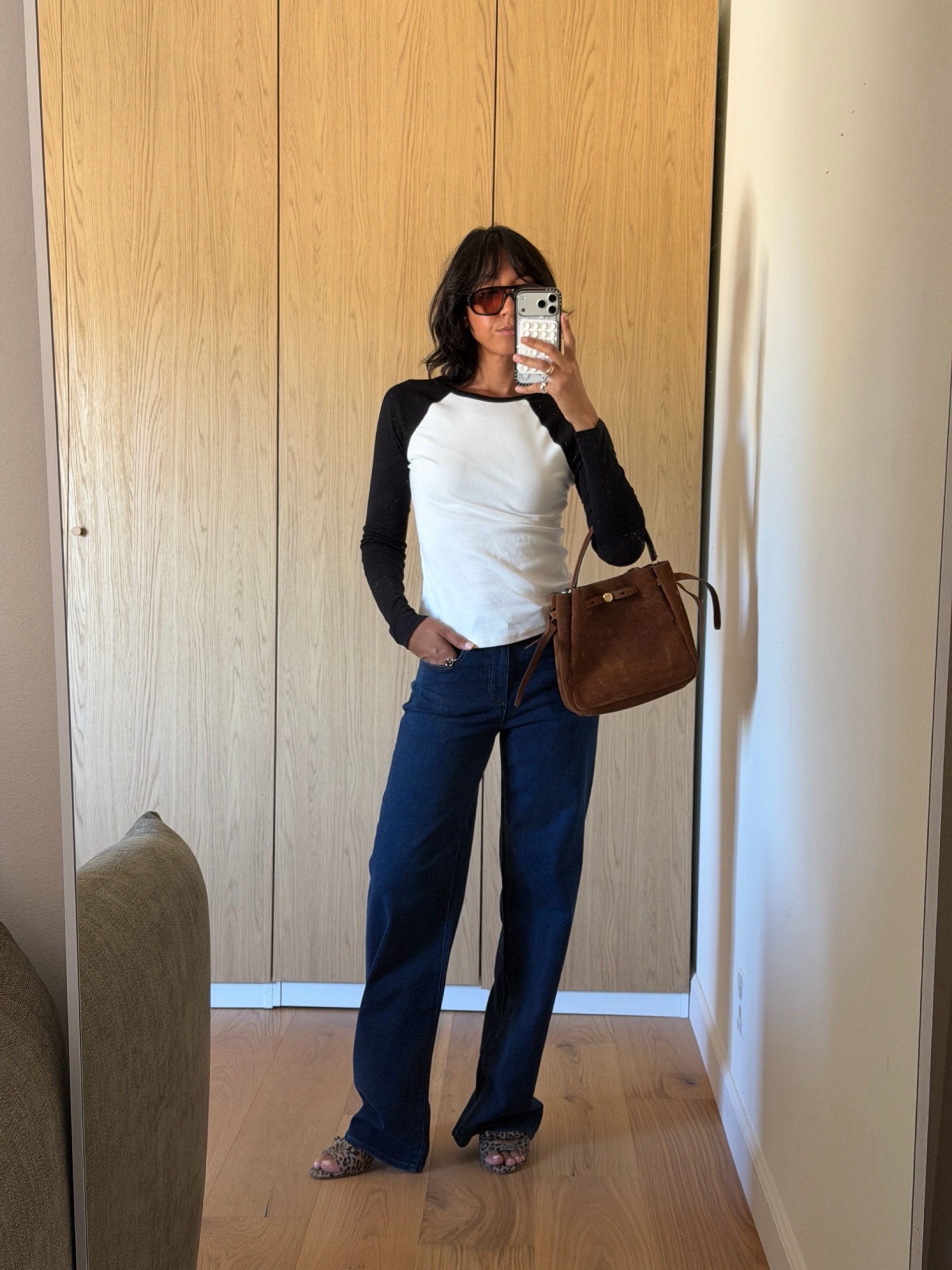 A woman wearing new fall wardrobe basics in 2026.