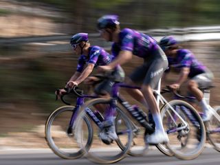 The new MAAP Jayco AlUla kit, a largely purple jersey with green flashes, paired with grey shorts