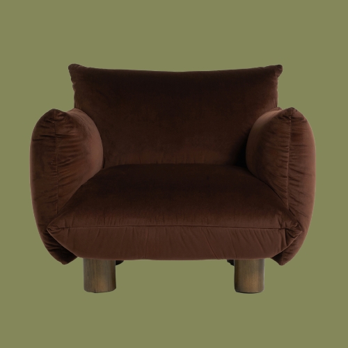 brown armchair on a green background