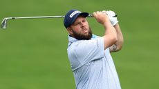 Andrew Johnston hits an iron shot during the 2024 BMW PGA Championship at Wentworth
