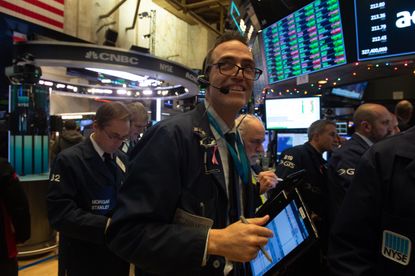 Wall Street traders at the close of the bell 