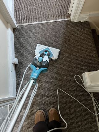 Using the carpet glide attachment to steam a section of carpet on my landing