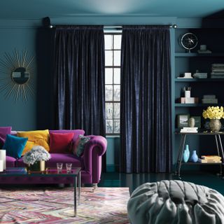dark velvet curtains in moody, jewel-hued scheme, with luxe textures and finishes.