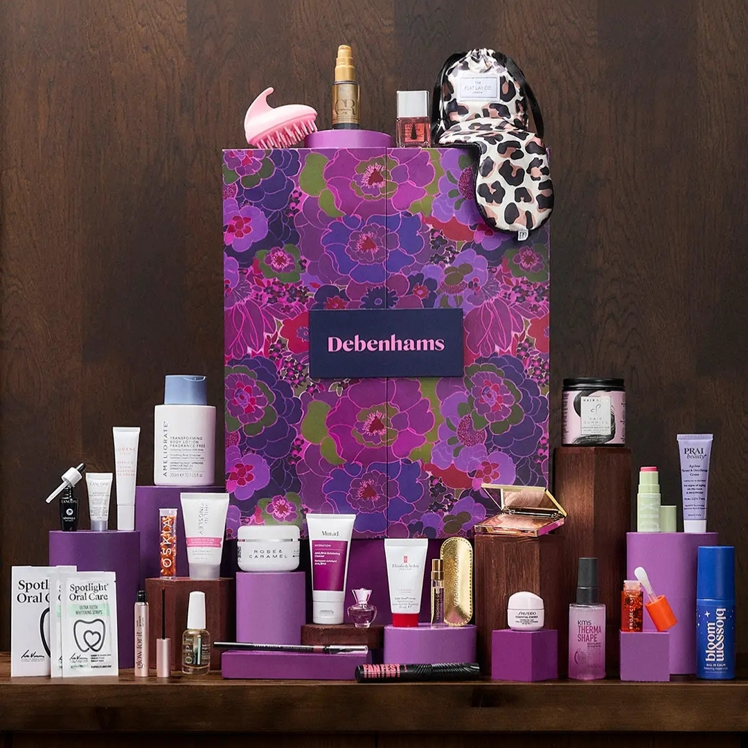 Debenhams Beauty Advent Calendar 2026 with its contents in front of it