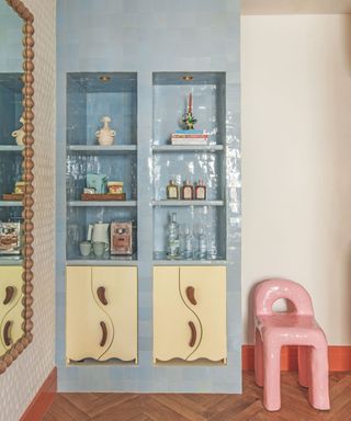 bar corner with inbuilt blue shelving unit with bar