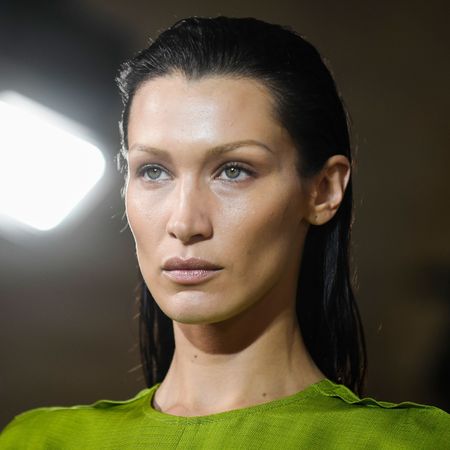 Close-up of Bella Hadid as she walks the runway.