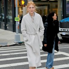 Nicole Kidman wearing a light grey wool coat