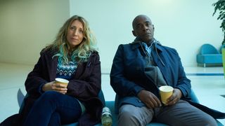 Janet (Daisy Haggard) and Samuel (Paterson Joseph) sitting together in Boat Story