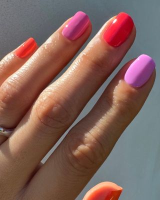 Colorful nails in pink and red