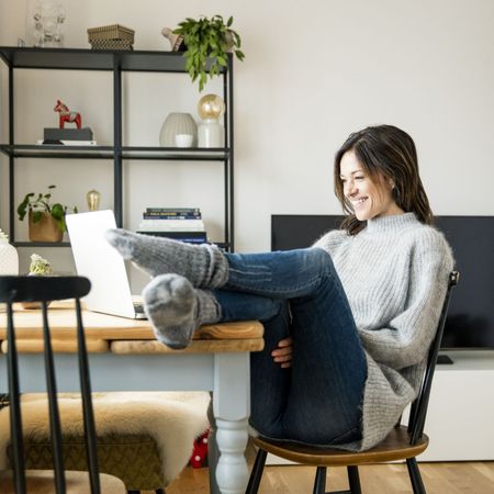 Woman enjoying a virtual date with her laptop