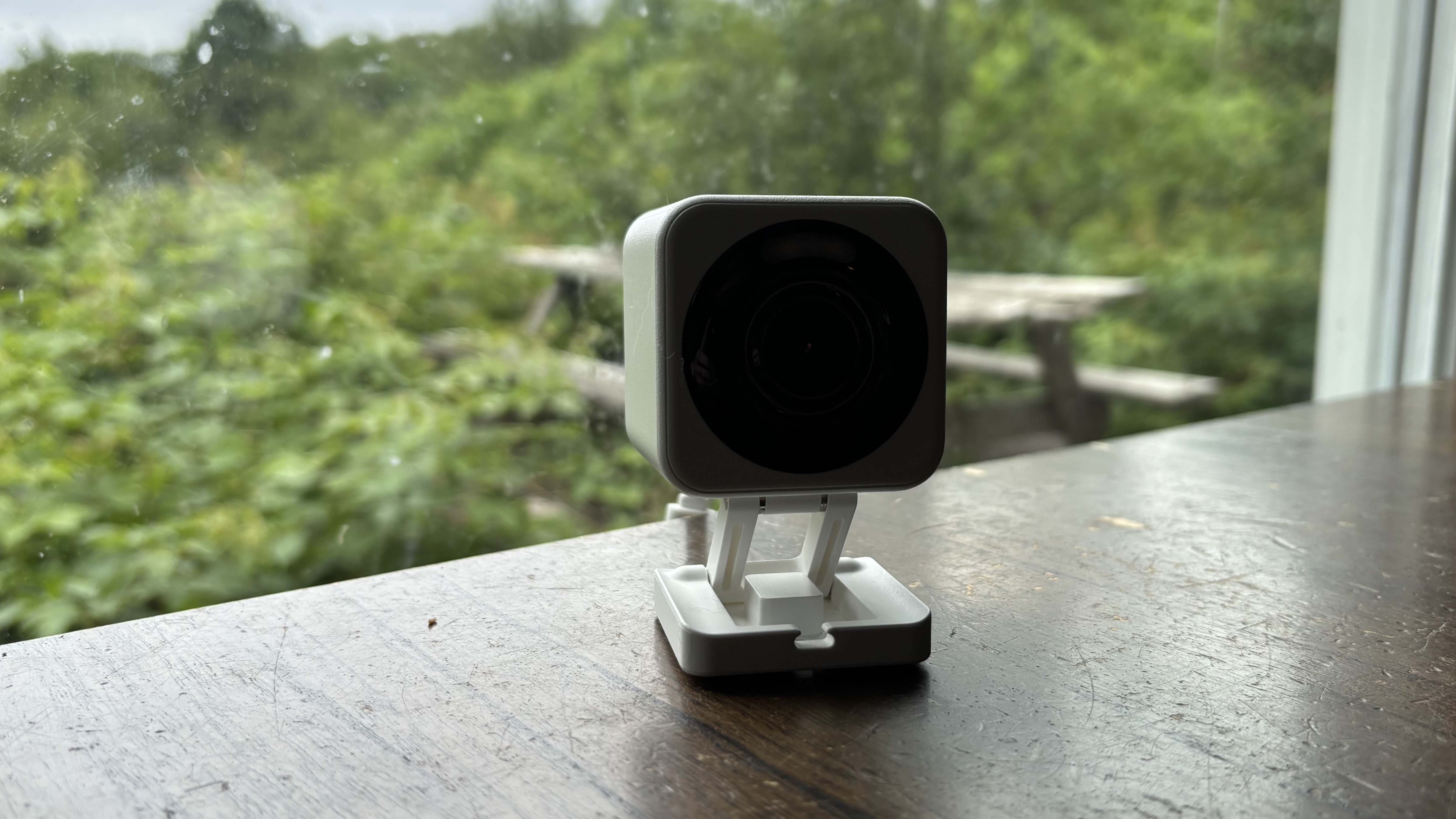 A Wyze camera sitting on a table