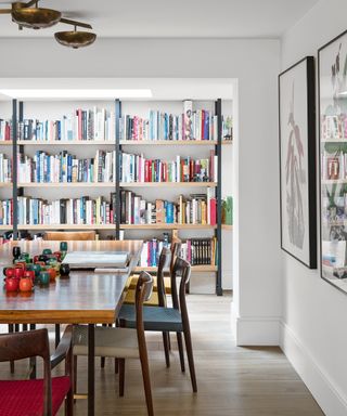 Book shelves in an open plan dining room