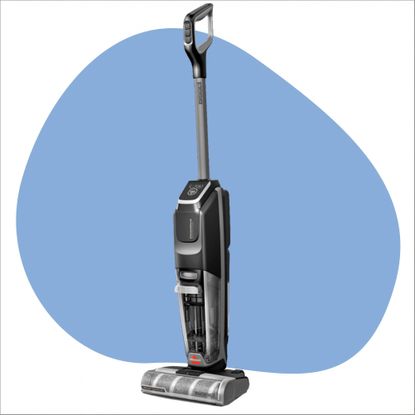 Bissell vacuum mop on a white background with a blue splodge