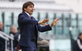 Antonio Conte making a hand gesture