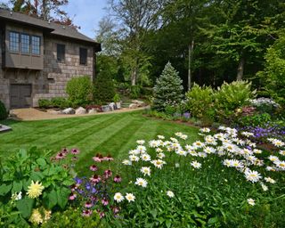 lawn with flowerbeds and trees