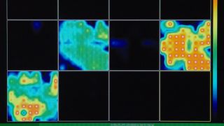 An activity map created by multi-electrode arrays shows how the mini lab brain is active (colored parts) at times and silent (black parts) at other times.