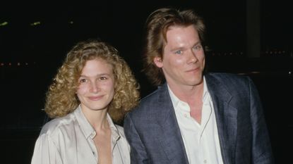 kevin bacon and kyra sedgwick on a black background