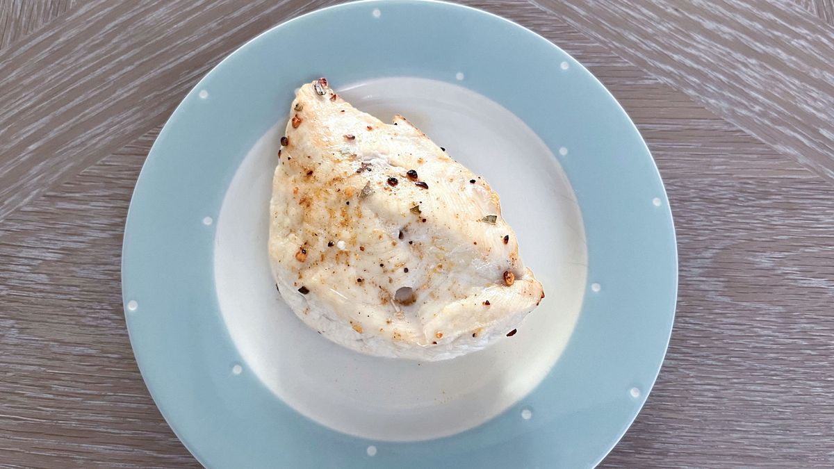 Cooked chicken breast on plate