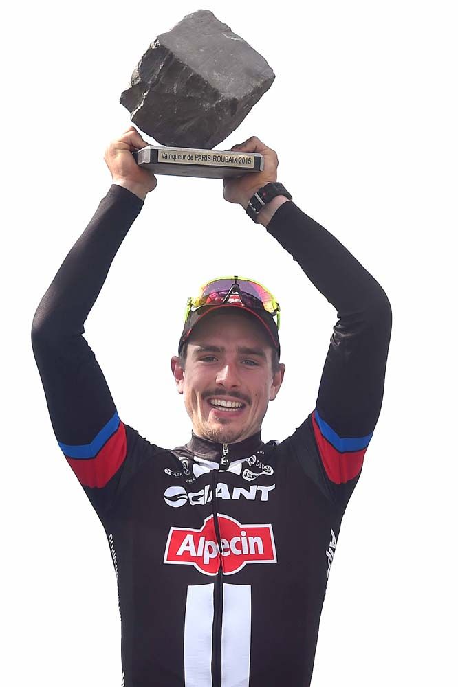 John Degenkolb (Giant-Alpecin) lifts the Paris-Roubaix winner's cobble