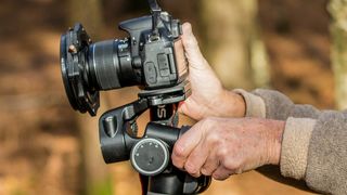 Geared head being used for landscape photography