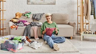 Decluttering clothes on the floor