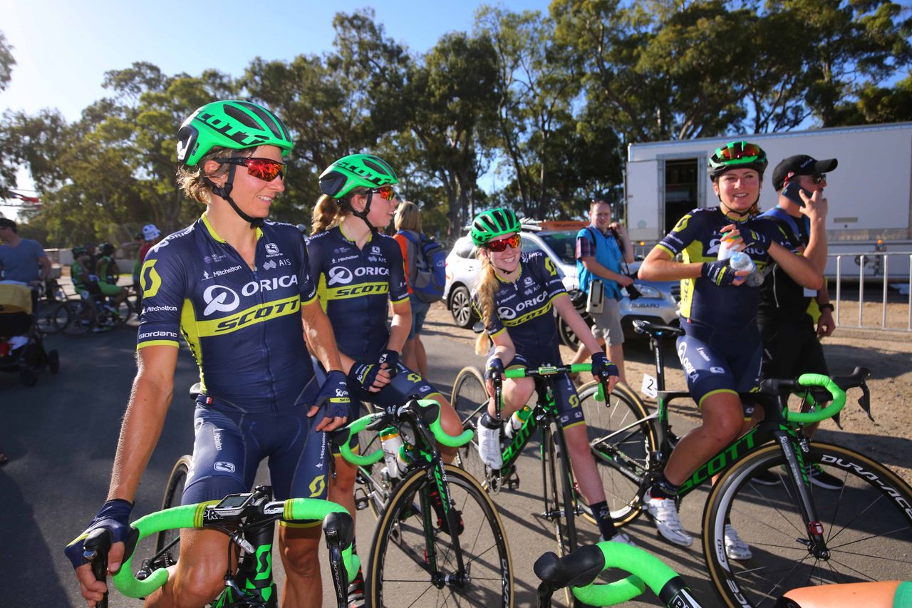 The Orica-Scott team catch their breath after the finish