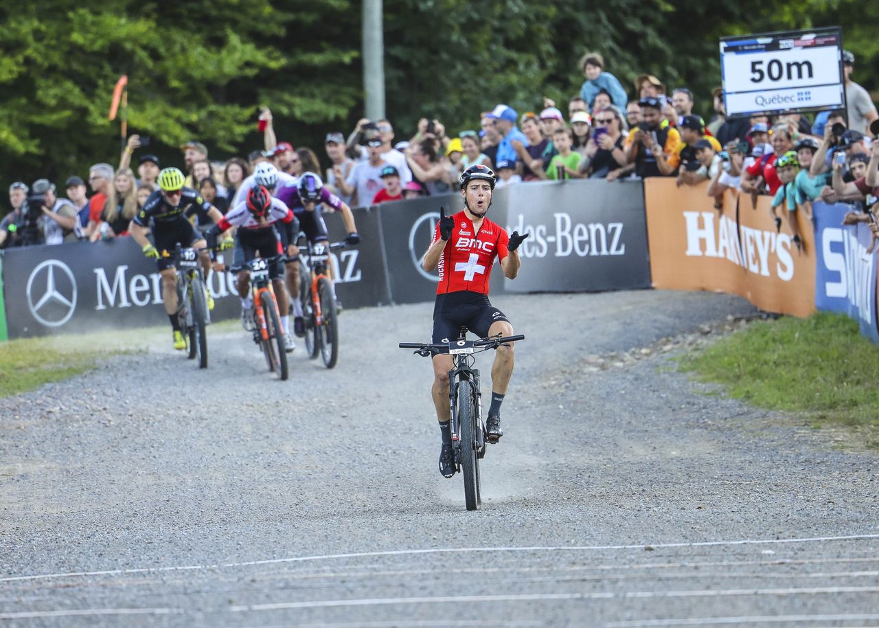 Filippo Colombo (BMC) starts to celebrate in the XCC race at the UCI MTB World Cup Mont-Sainte-Anne