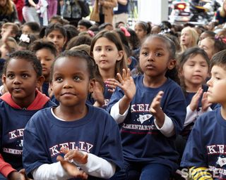 Grade-school students formed much of the audience at Kelly Elementary School's naming on May 19, 2016.