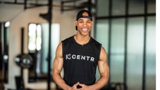 Male personal trainer smiling