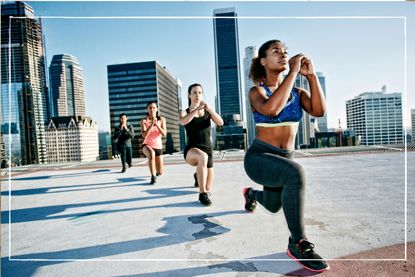 group of women taking part in thigh exercises