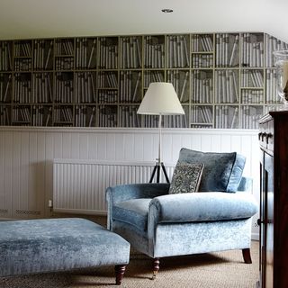 living room corner with blue chairs and lamp