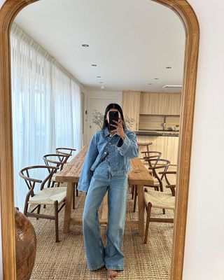 Monikh in a cropped denim jacket