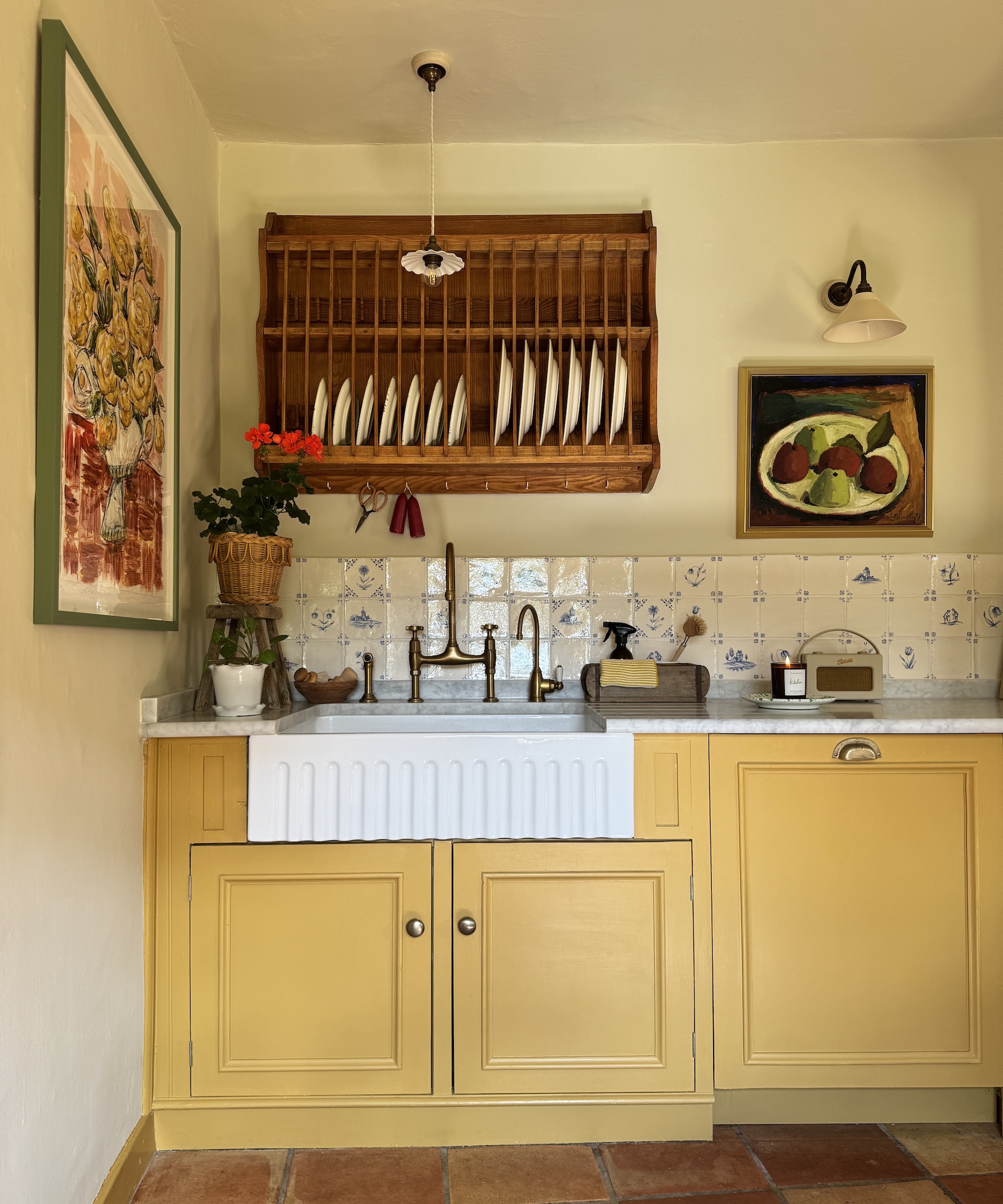 fluted belfast sink in yellow kitchen