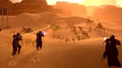 Three players on a desert planet shooting bug aliens during one of the best games like Borderlands, Helldivers 2. 