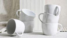 One of the best cappuccino cups on the market, the The White Company Portobello Mug set of six stacked on top of each other